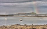 'Rainbow Over Dunstanburgh Castle' by Dave Dixon LRPS