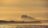 'On Bamburgh Beach' by David Burn LRPS