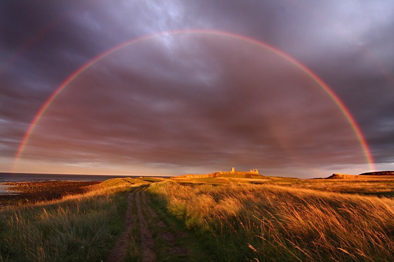 'Dunstanburgh Castle Rainbow' by Dave Dixon LRPS
