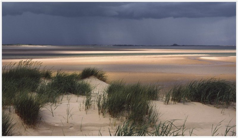 'Storm Light Over Holy Island' by Ken Baker LRPS